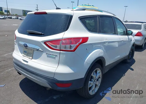 2015 Ford Escape Titanium z USA, uszkodzony, nr VIN 1FMCU0J92FUB25268